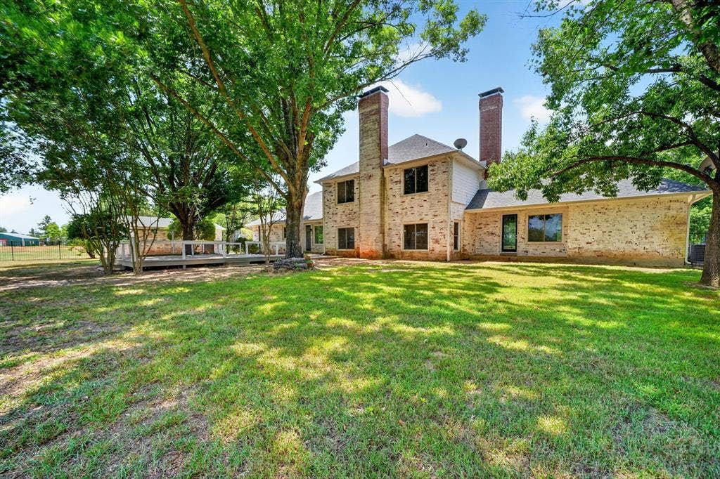 1201 Robbins Road, Athens, TX 75751 Back of home. Fenced backyard area.