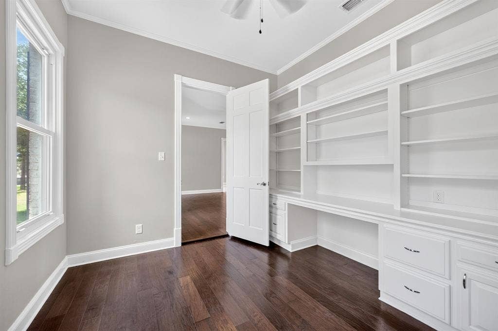 1201 Robbins Road, Athens, TX 75751 Office connected to primary ensuite featuring built ins for storage & abundant natural lighting.