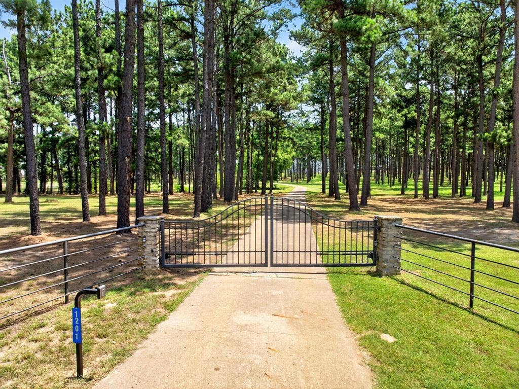 1201 Robbins Road, Athens, TX 75751 Private electric gated entrance to 1201 Robbins Road.
