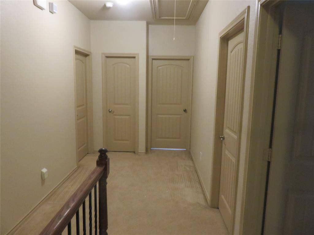 1122 Walter Stephenson Road, Midlothian, TX 76065 Hallway featuring neutral wall tones and beige carpeted flooring