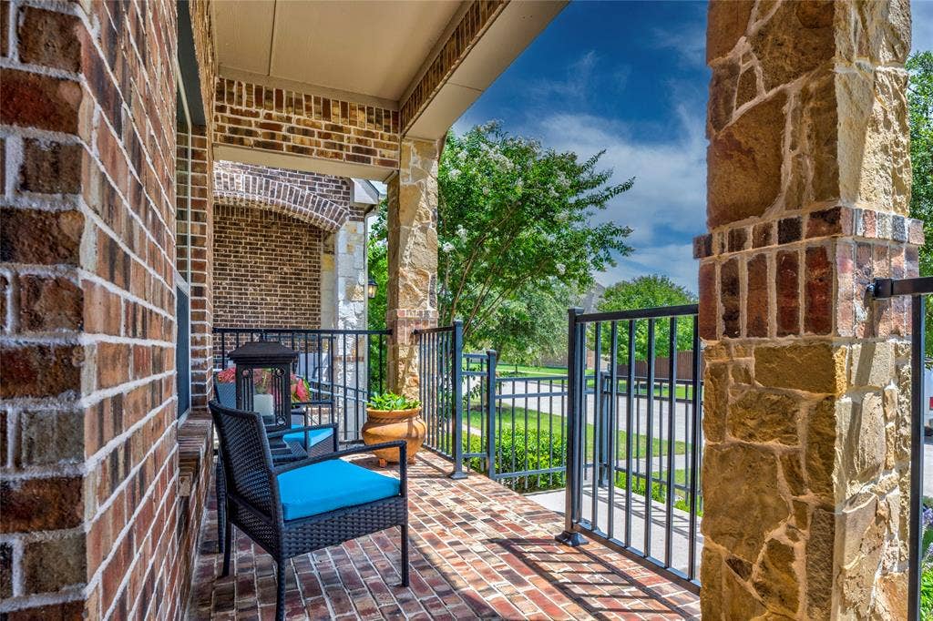 8721 Ludlow Drive, Frisco, TX 75036 Front porch is upgraded with brick paver patio.