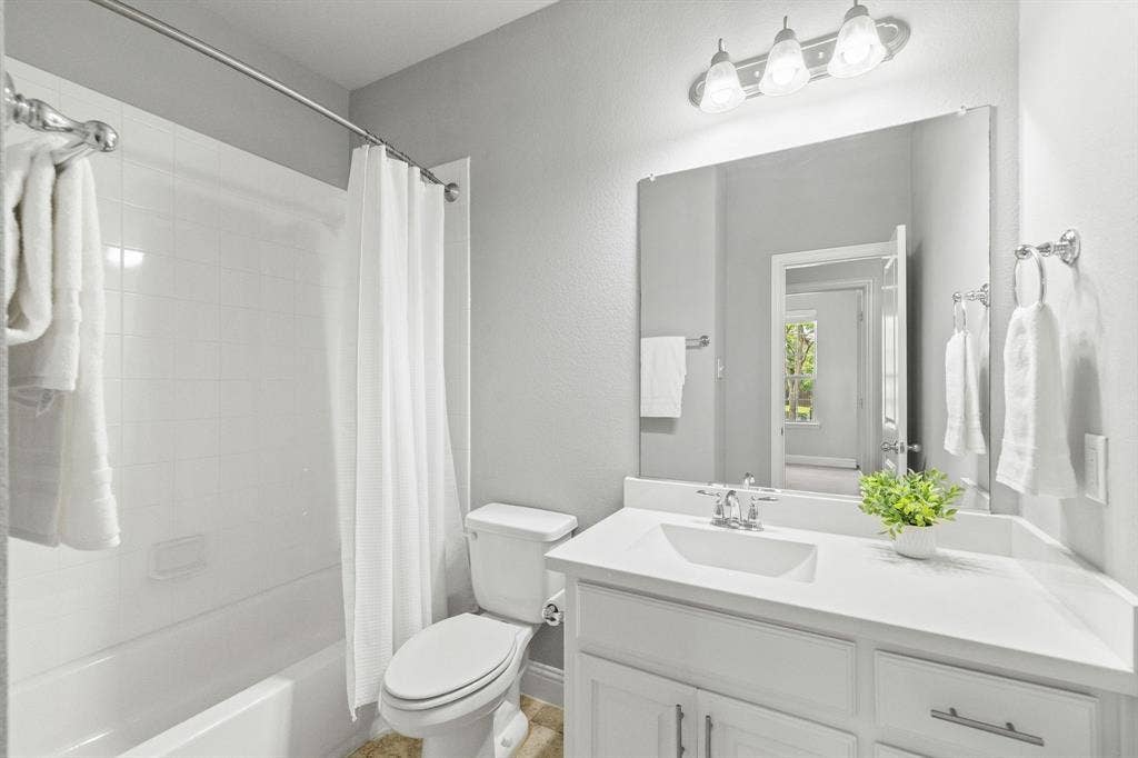 Full bathroom at the front of the home.