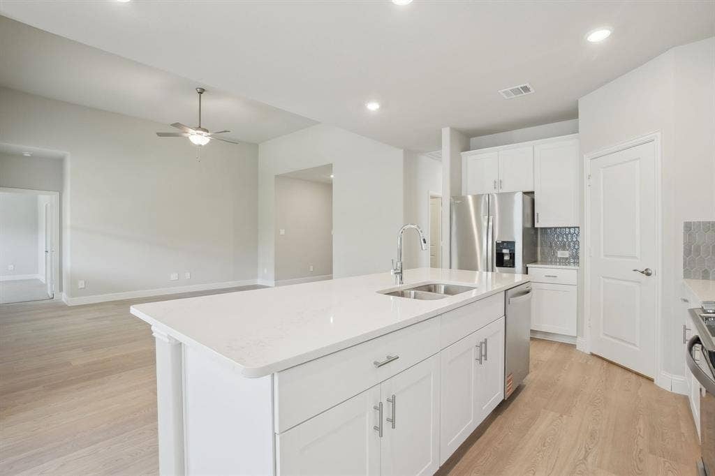4011 Benbrook Drive, Farmersville, TX 75442 Photo is not of the actual home, but is an inspirational photo of builder’s model home and may depict options, furnishings, and/or decorator features that are not included.