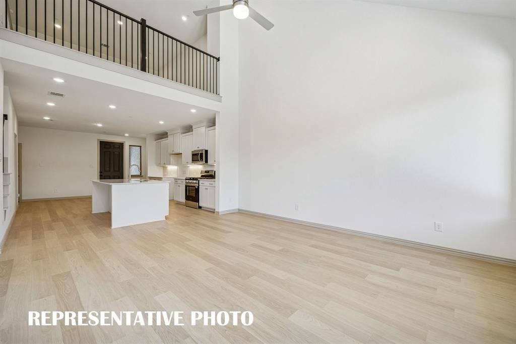 3563 Pierce Lane, Grand Prairie, TX 75052 With the family room open to the game room, you'll enjoy a multi level entertainment zone in this fantastic floor plan. REPRESENTATIVE PHOTO