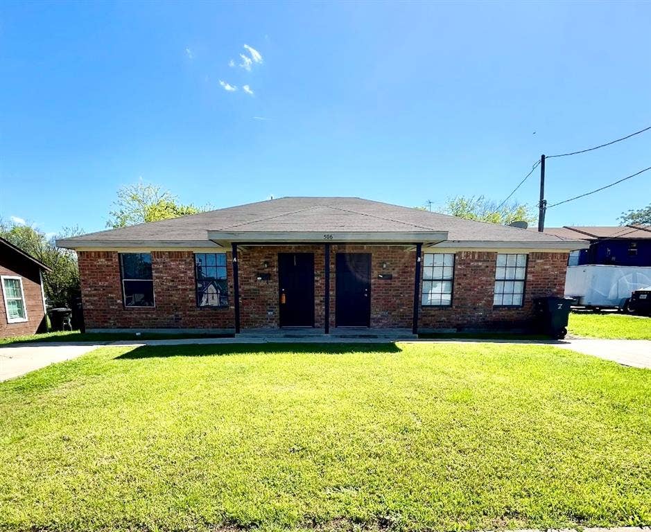 506 W Green Avenue, Killeen, TX 76541 Single story home with a front yard and brick siding