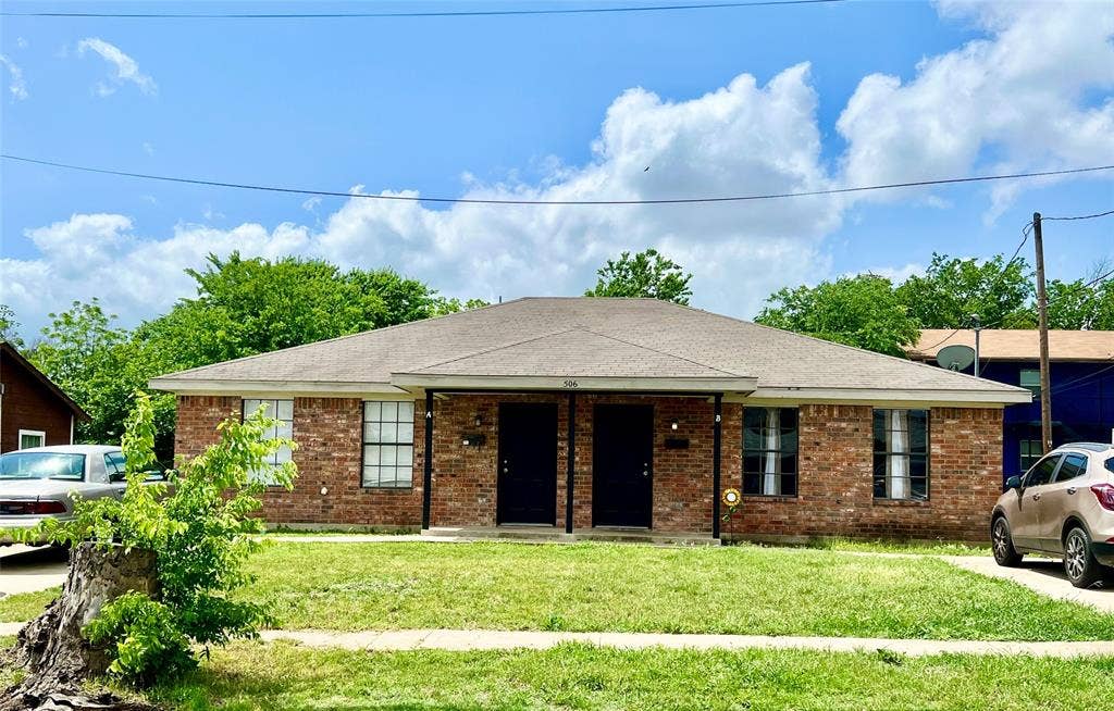 506 W Green Avenue, Killeen, TX 76541 Single story home featuring brick siding, a front lawn, and a shingled roof
