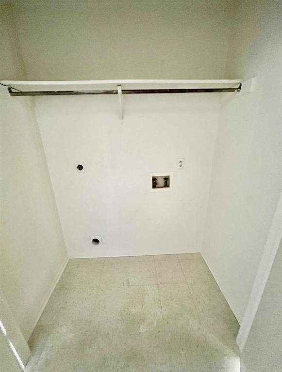 506 W Green Avenue, Killeen, TX 76541 Washroom featuring hookup for an electric dryer, hookup for a washing machine, and tile patterned floors