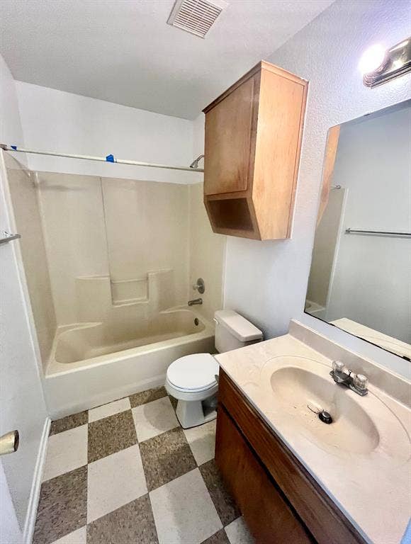 506 W Green Avenue, Killeen, TX 76541 Bathroom with bathing tub / shower combination, light flooring, and vanity