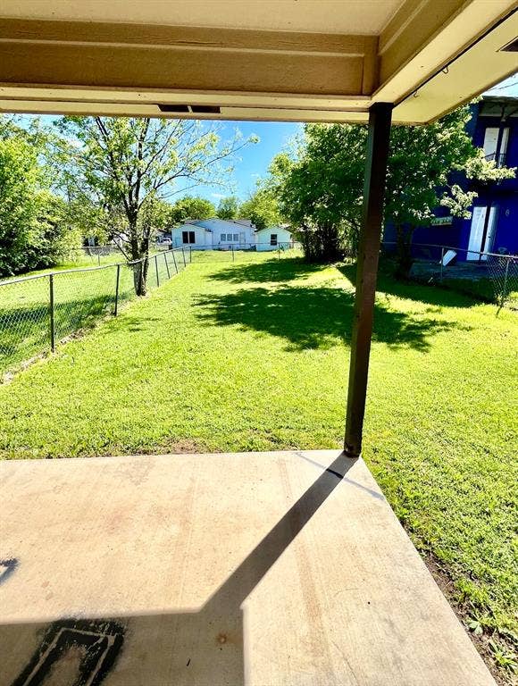 506 W Green Avenue, Killeen, TX 76541 Fenced backyard with a patio area