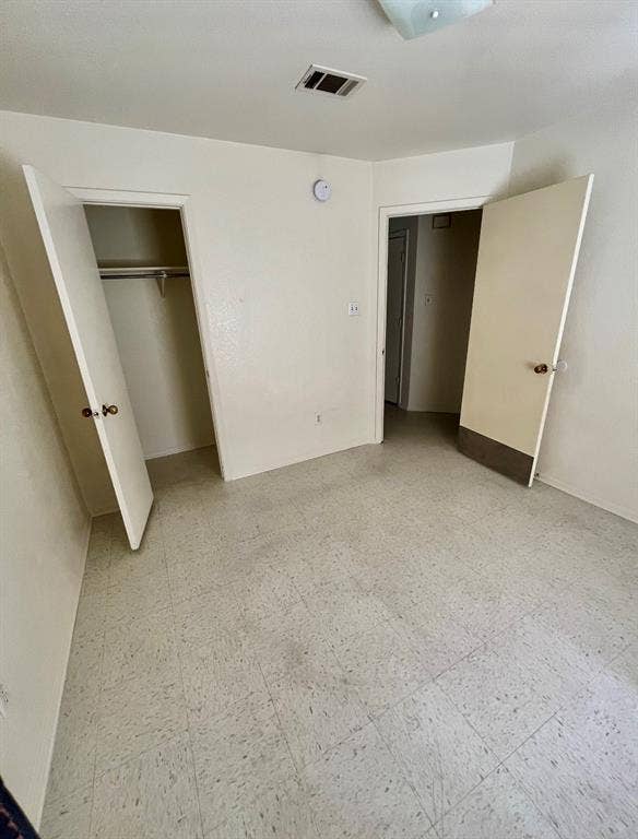 506 W Green Avenue, Killeen, TX 76541 Unfurnished bedroom featuring light flooring and a closet