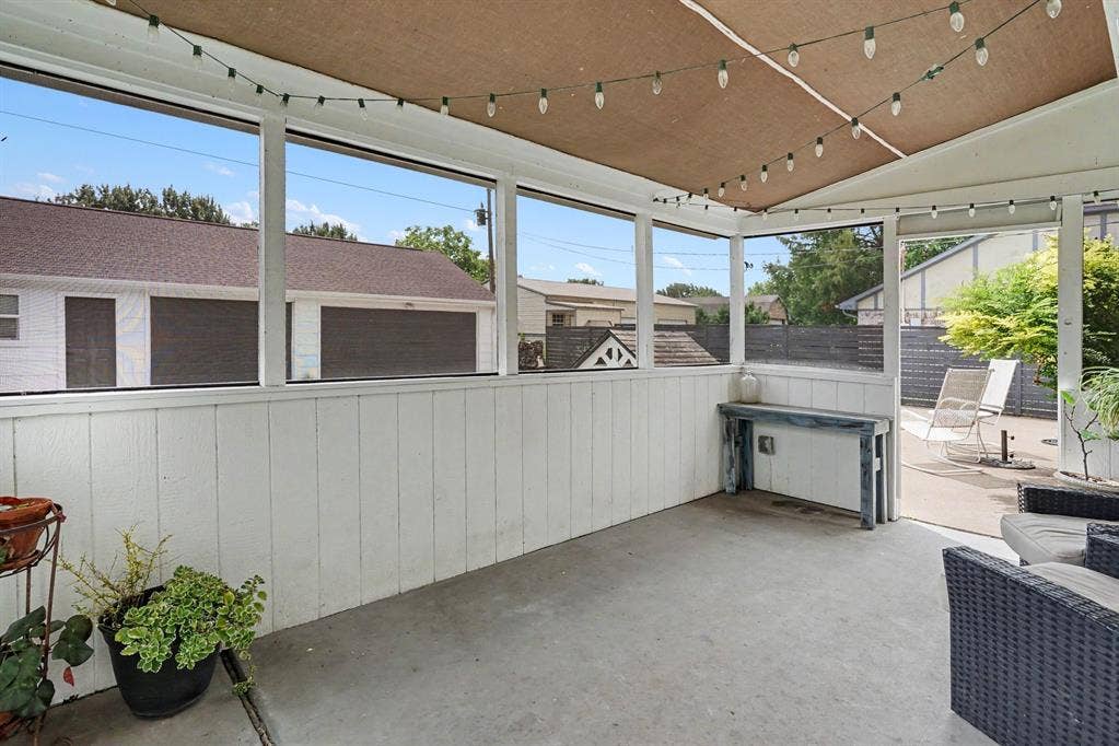 708 Summer Place, Murphy, TX 75094 Open air, screened porch off of the kitchen.