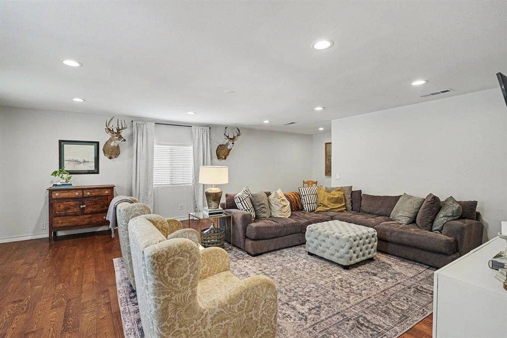 708 Summer Place, Murphy, TX 75094 Extra large family room with sliding barn door for privacy or used as a guest room.
