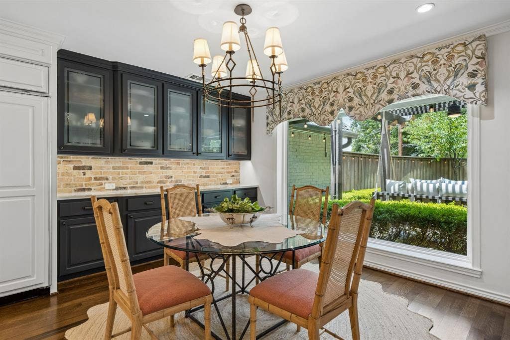 6829 Midcrest Drive, Dallas, TX 75254 Breakfast Room with Built in China Cabinet and gorgeous picture window for views of back yard and patio area.