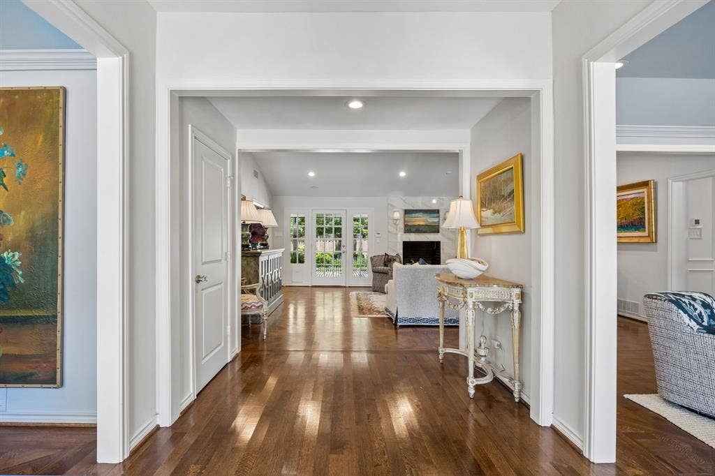 6829 Midcrest Drive, Dallas, TX 75254 Entry with Split Formals on each side and open to the Family Room.