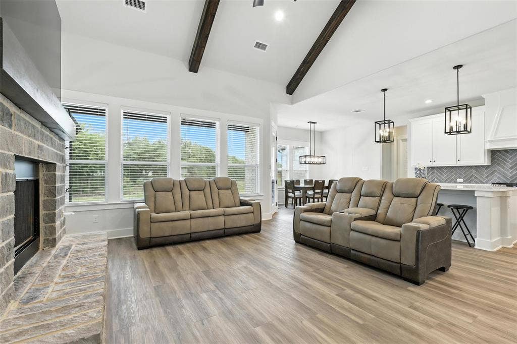3141 Claire Drive, Midlothian, TX 76065 Expansive living area with high vaulted ceilings and exposed wood beams