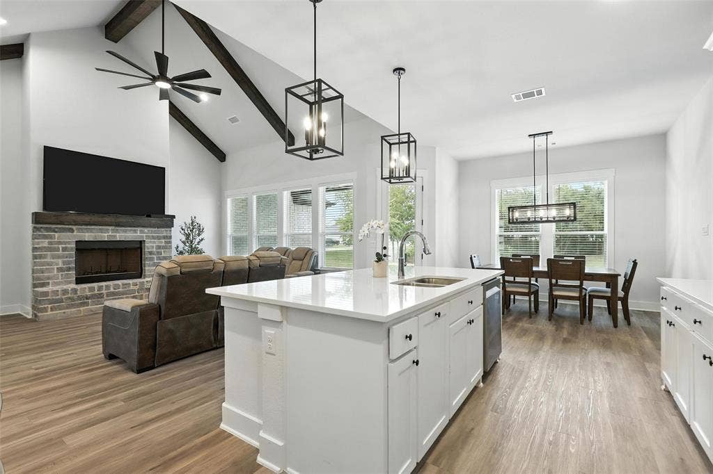 3141 Claire Drive, Midlothian, TX 76065 Open-concept living space featuring wood-finish flooring throughout