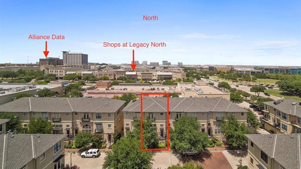 5717 PANTHEON Court, Plano, TX 75024 Three-story townhome featuring a neutral-toned facade, multiple windows, and a dark-toned roof