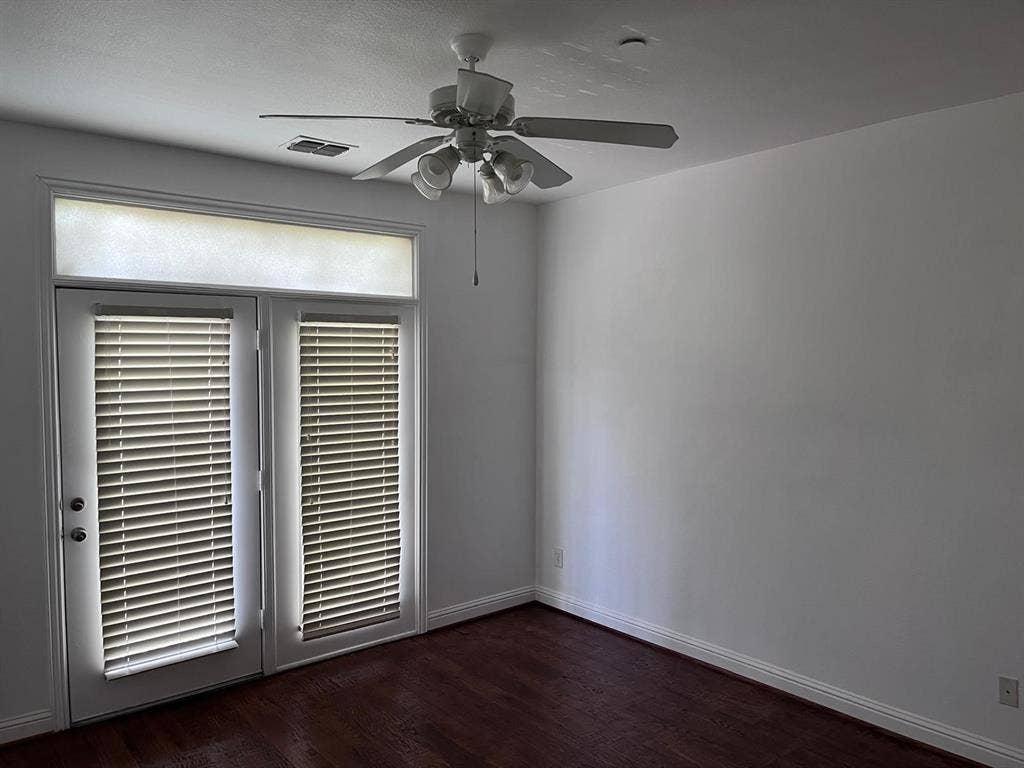 5717 PANTHEON Court, Plano, TX 75024 French doors with integrated blinds and a transom window