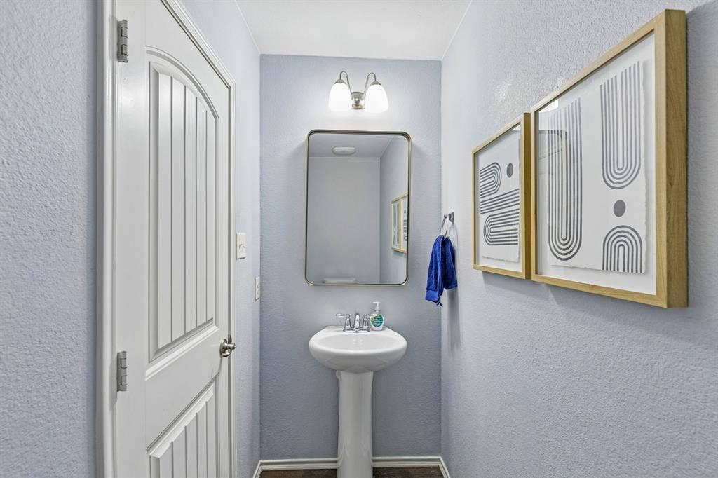 3500 Brazos Street, Melissa, TX 75454 powder bath located on the main floor, perfect for guests