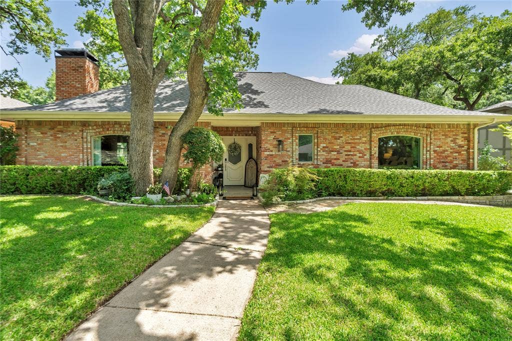 1830 Rhinevalley Drive, Arlington, TX 76012 A well maintained home with a lush yard.