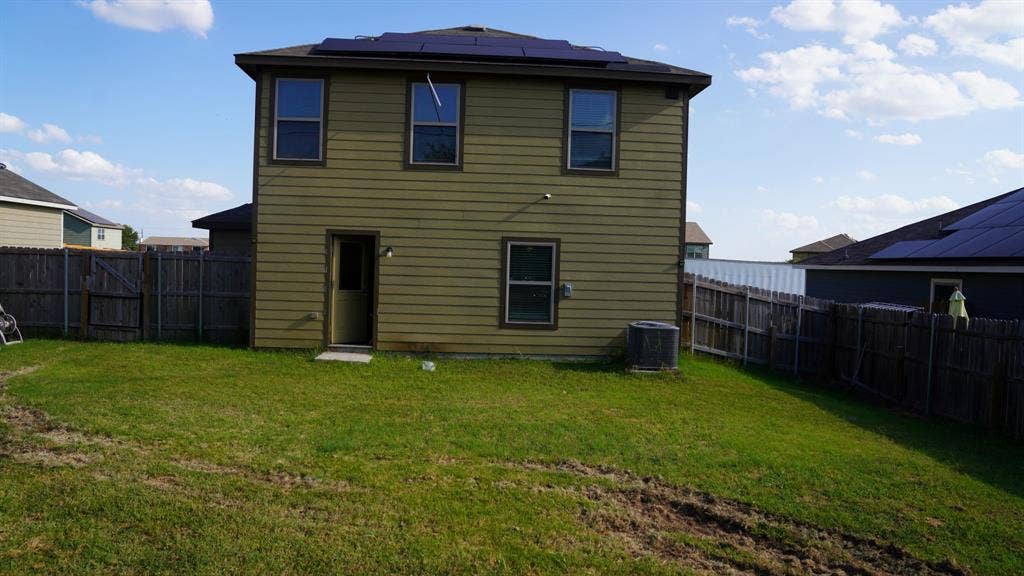 1321 Eagle Lake Drive, Azle, TX 76020 Rear exterior with two stories and horizontal siding