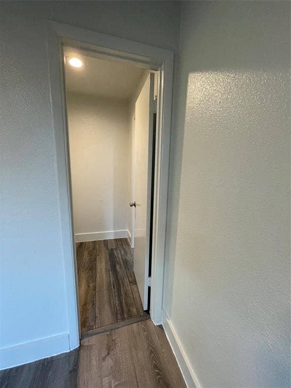 822 Johnnie Row, Seagoville, TX 75159 Hall with dark wood-type flooring
