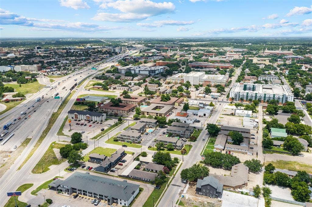 1405 Speight Avenue, #1, Waco, TX 76706 Aerial perspective showcasing a vibrant urban landscape with diverse architectural styles