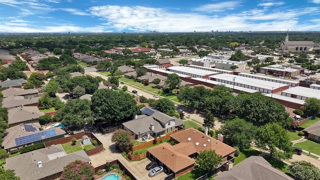 4021 San Mateo Drive, Plano, TX 75093 Aerial perspective showcasing a residential area with mature tree coverage