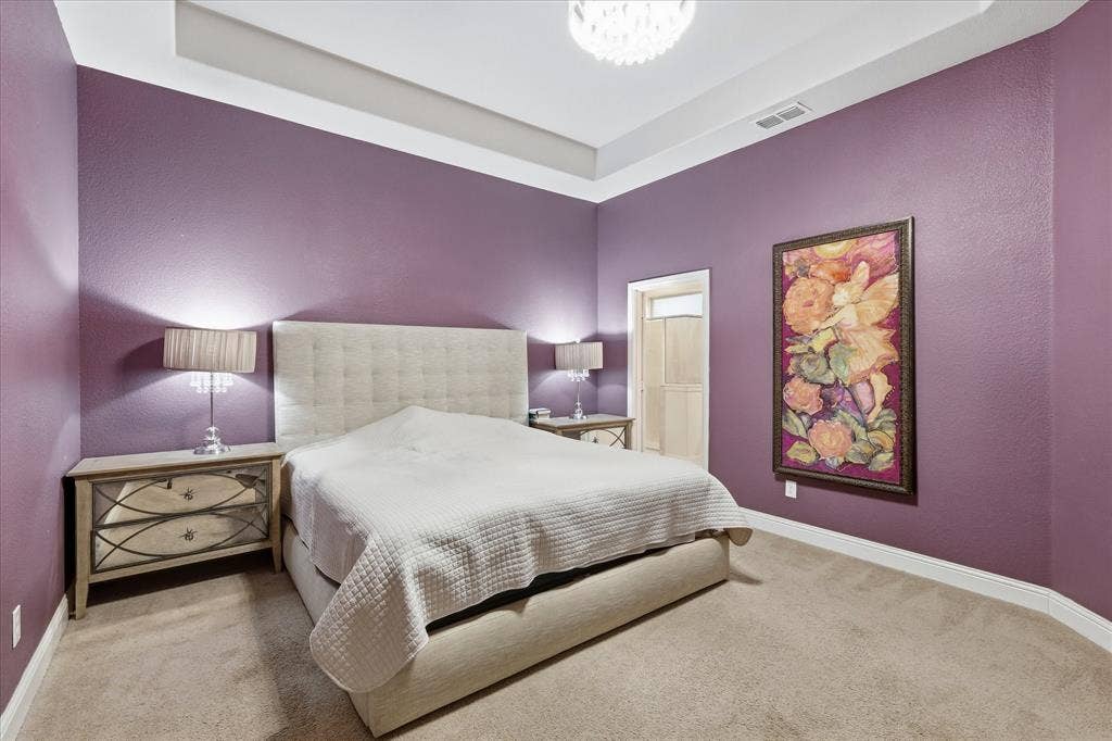 904 10th Street, Argyle, TX 76226 Bedroom featuring purple walls and neutral carpet flooring