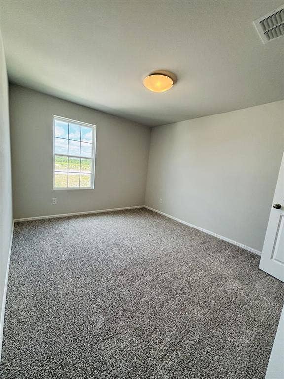 912 Santa Lucia Drive, Anna, TX 75409 Carpeted empty room featuring baseboards