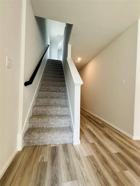912 Santa Lucia Drive, Anna, TX 75409 Stairs with wood finished floors and recessed lighting