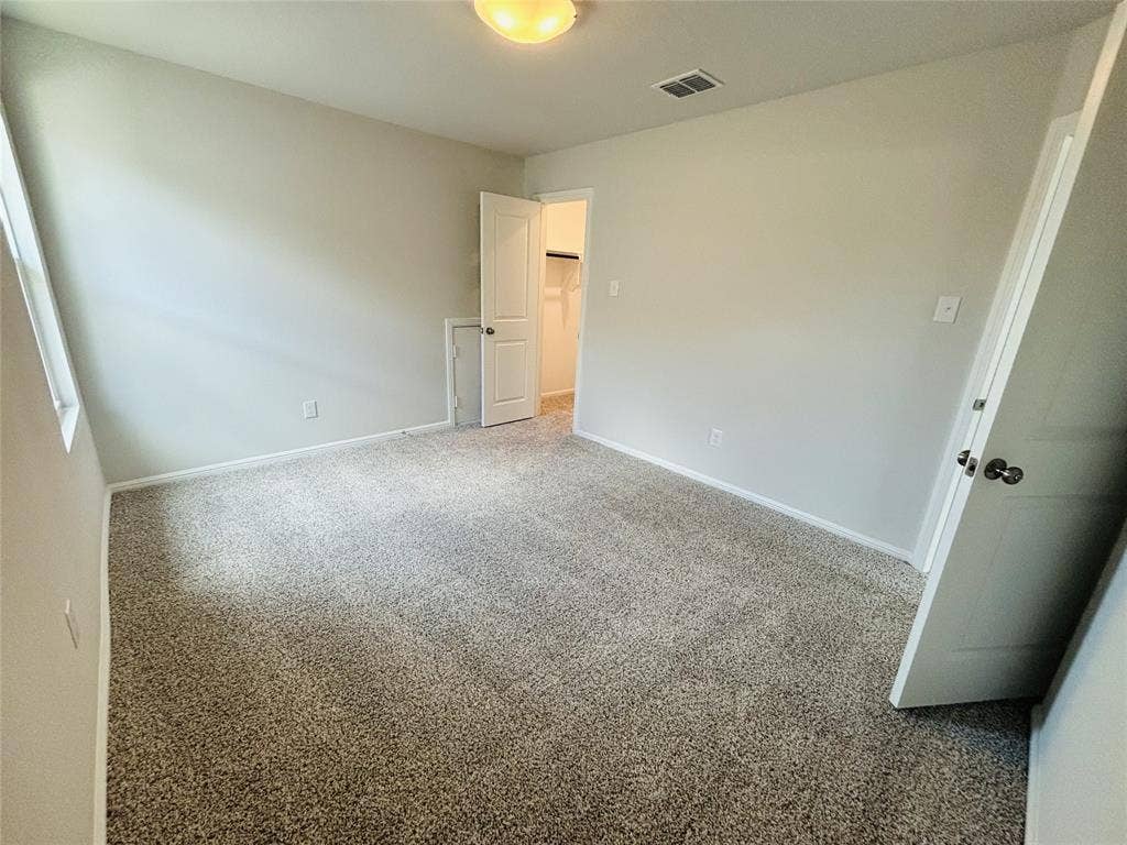 912 Santa Lucia Drive, Anna, TX 75409 Unfurnished bedroom with carpet