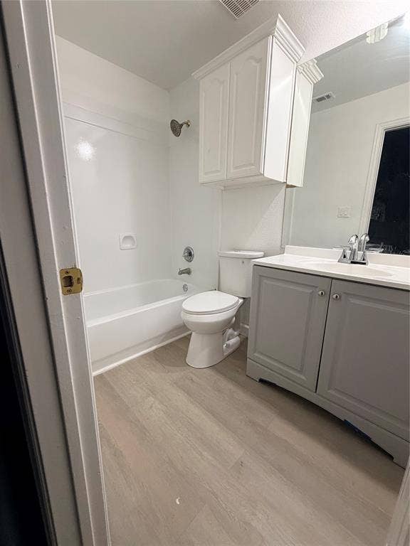 2301 Clearspring Drive S, Irving, TX 75063 En suite bathroom with vanity, integrated sink, brushed nickel faucet, and a large wall-mounted mirror