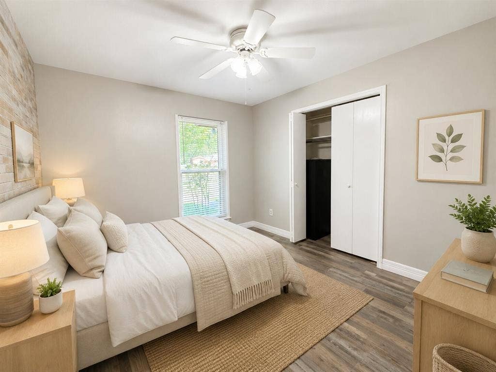 601 Ascot Drive, Euless, TX 76040 Bedroom featuring wood-finish flooring, a contemporary ceiling fan, and a window with blinds