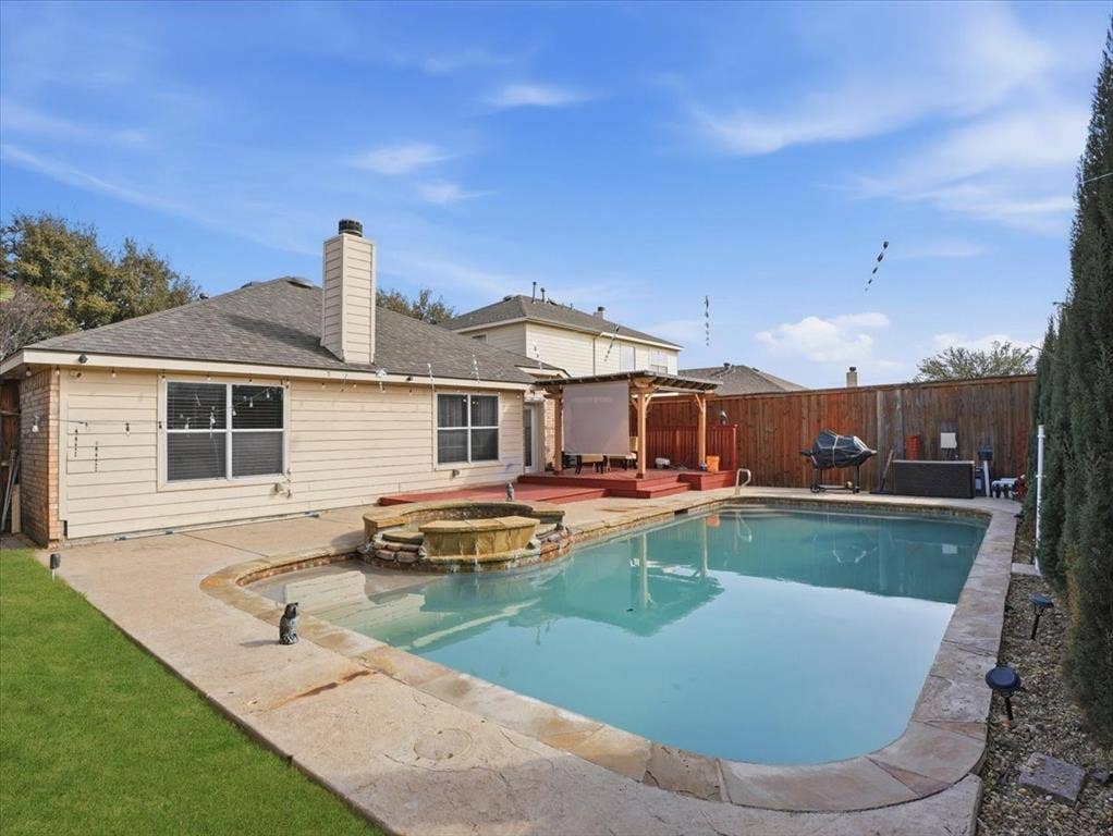 1039 Wood Brook Drive, Grand Prairie, TX 75052 Backyard featuring pool