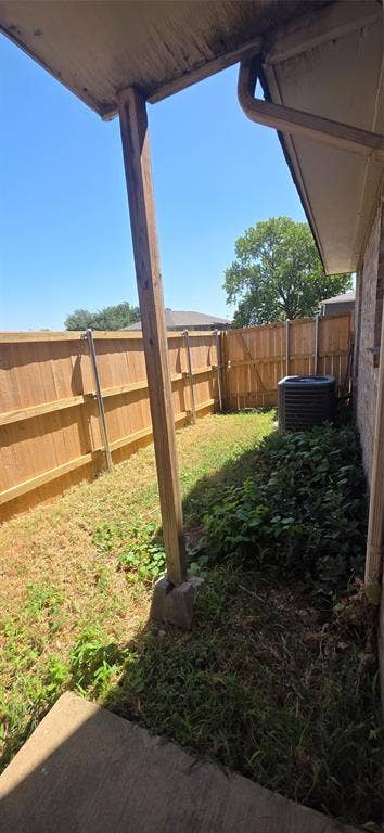 235 Vista Way, Benbrook, TX 76126 Covered patio area with concrete pad and wood support beams