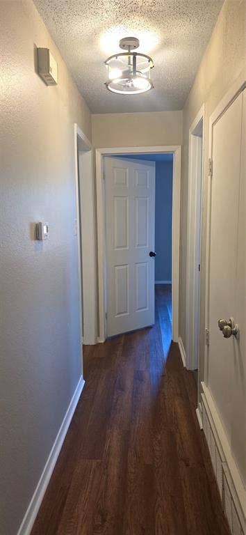 235 Vista Way, Benbrook, TX 76126 Wood-finish flooring throughout, modern flush-mount lighting, and paneled interior doors