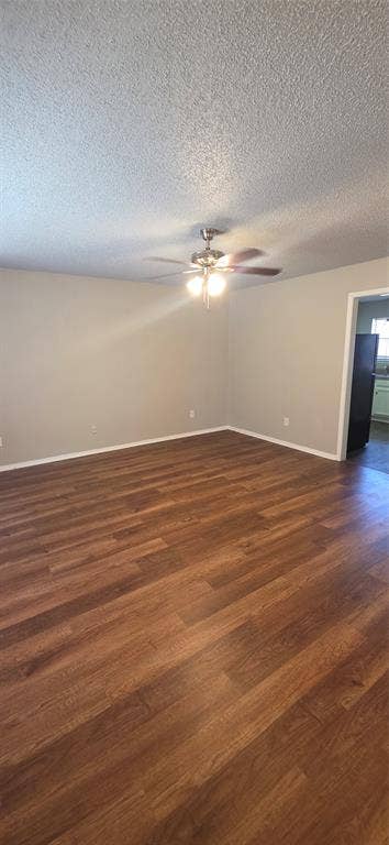 235 Vista Way, Benbrook, TX 76126 Wood-finish flooring with neutral wall tones and a ceiling fan