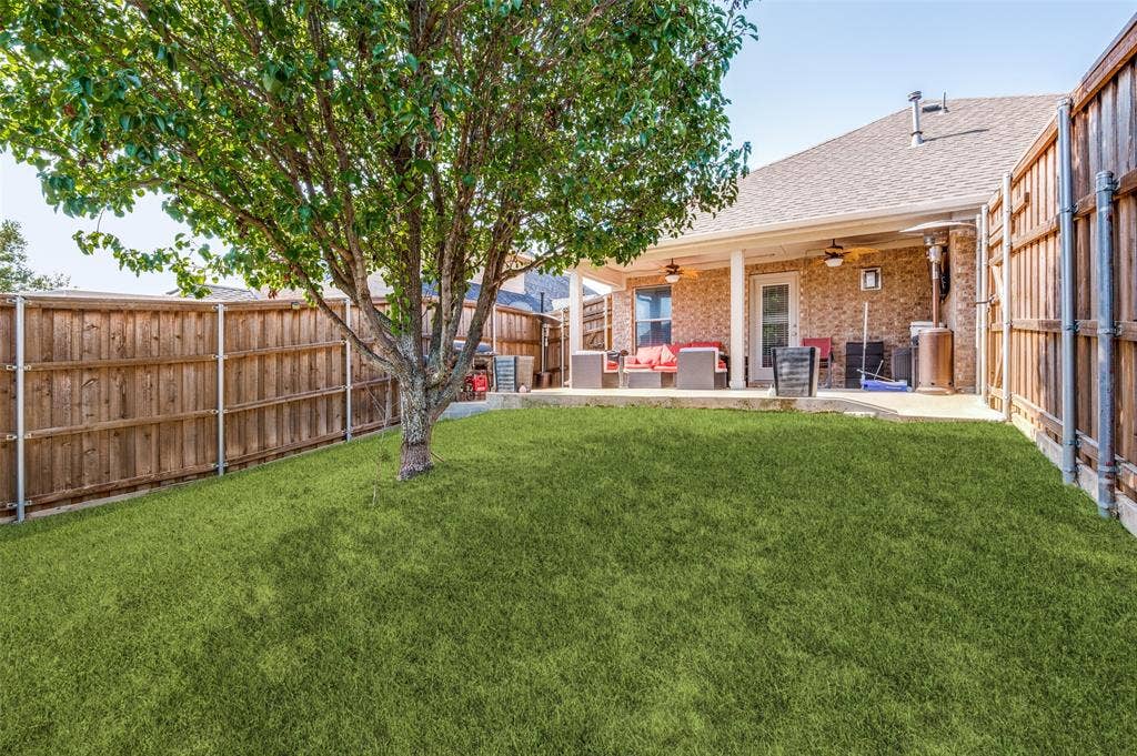 437 Castle Street, DeSoto, TX 75115 Color of lawn is enhanced due to dry weather conditions.
