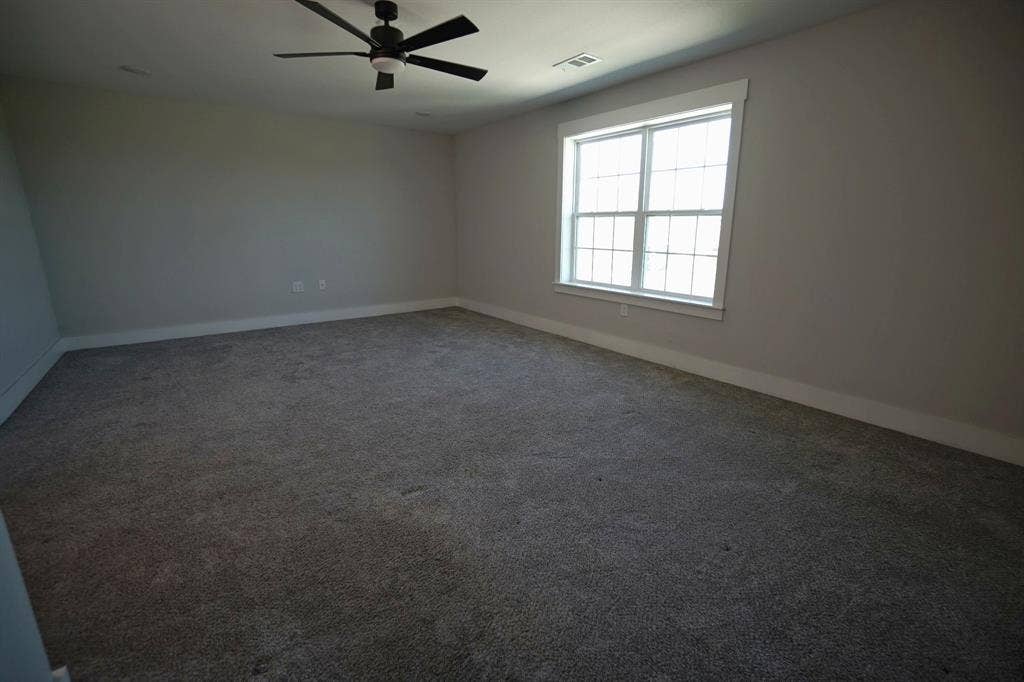 1764 Palladio Loop, Princeton, TX 75407 Recessed lighting, ceiling fan, neutral wall paint, white trim, and a window with muntins