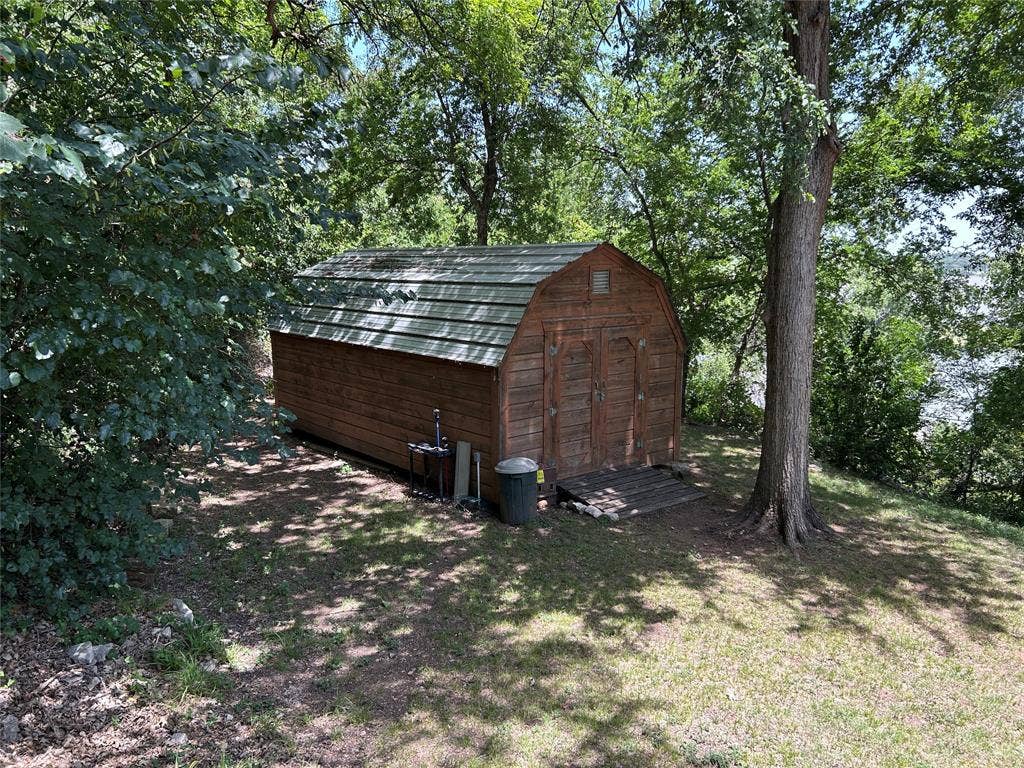 2546 Rockcliff Court, Granbury, TX 76048 23x12 storage building