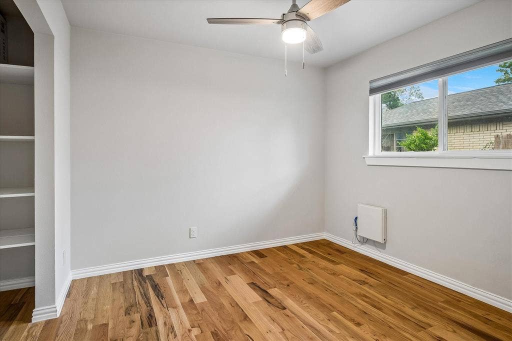 Walk-in open closet in the secondary bedroom