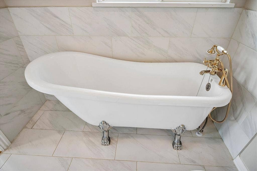 Imagine relaxing in this wonderful soaking tub located on the 2nd level - second Primary Bathroom.