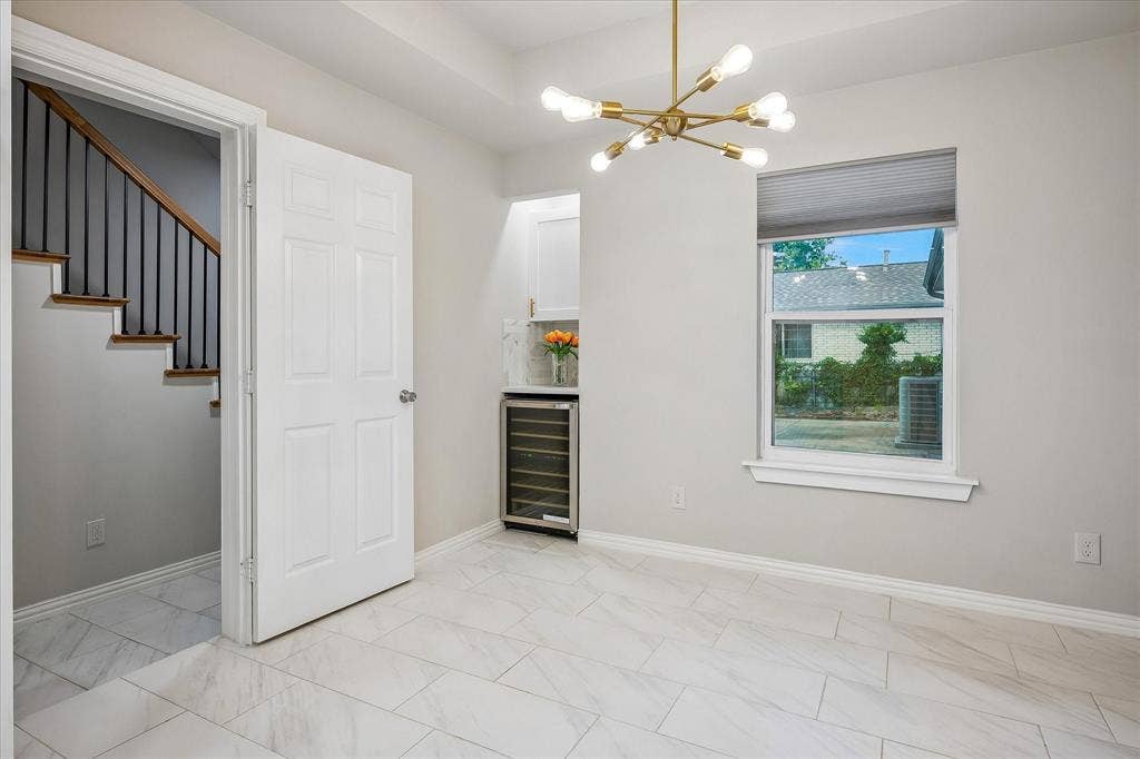 The breakfast area has views and also a Beverage Fridge and Counter for morning coffee!