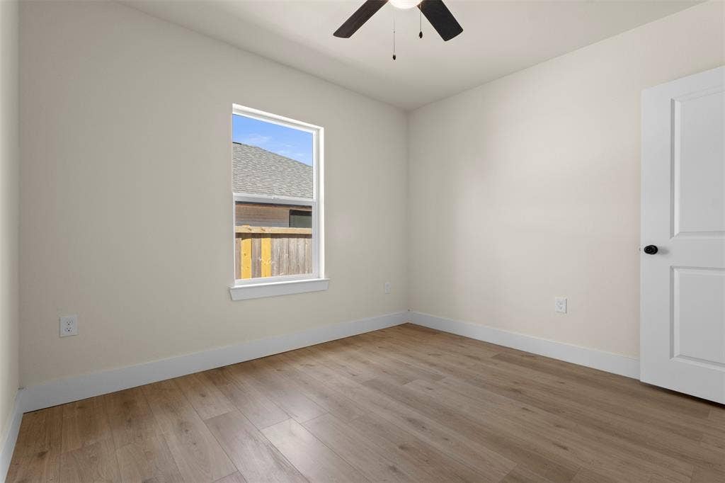 1104 S Brighton Avenue, Dallas, TX 75208 Wood-finish flooring with white trim