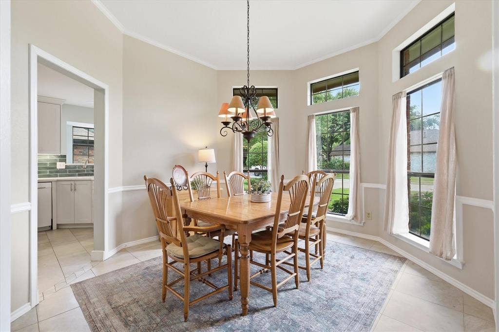 642 Eagle Drive, Coppell, TX 75019 Dining room was recently retextured and Painted a warm neutral.