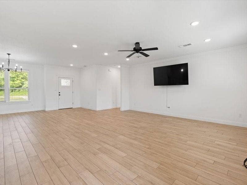 5528 Mesa Loop, Granbury, TX 76048 Spacious interior featuring wood-look tile flooring throughout