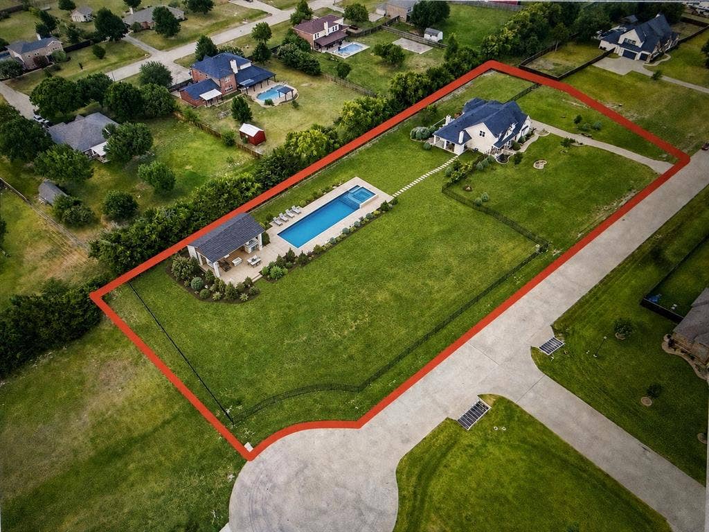 build this pool and pool house and still have a huge yard-“AI-GENERATED CONCEPTUAL RENDERING. Pool/outbuilding/sports court shown does not currently exist and is presented only to illustrate a possible improvement.”