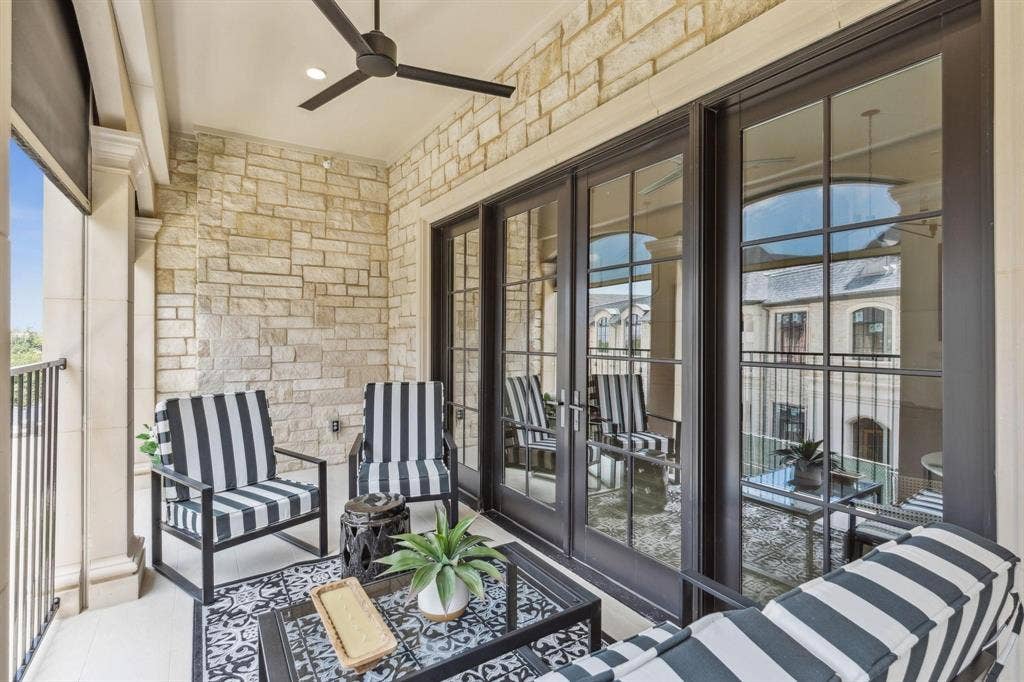 6801 Corporate Drive, #A2, Plano, TX 75024 These photos are of a similar floorplan, patio on first floor.