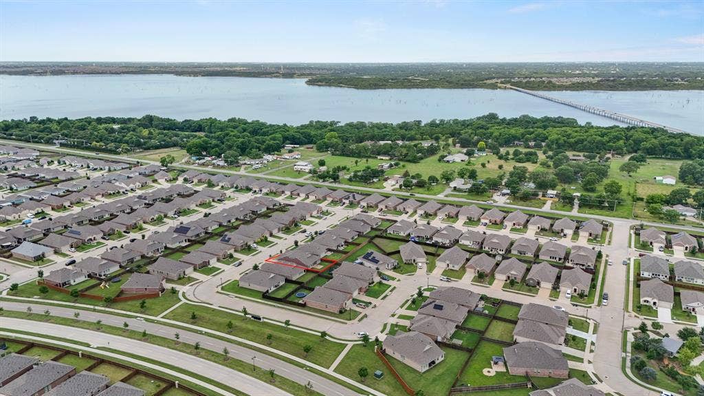 714 Stallings Drive, Princeton, TX 75407 Expansive residential development featuring a structured street grid and consistent architectural styles